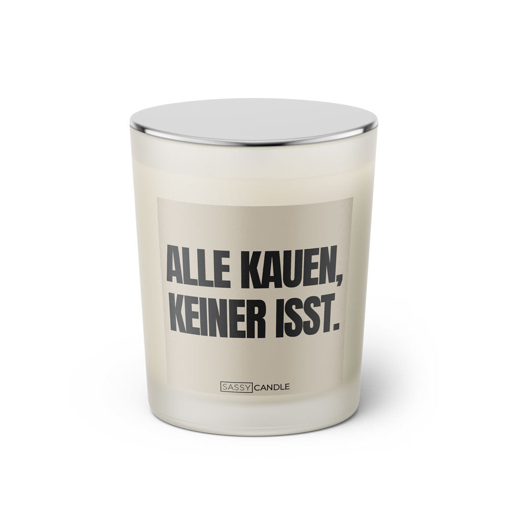 Duftkerze mit Spruch: Alle kauen, keiner isst. Farbe schwarz und beige von Sassy Candle.