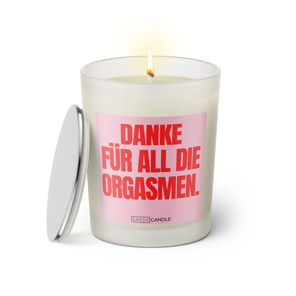 Duftkerze mit witzigen Spruch: Danke für all die Orgasmen. Farbe rosa und pink von Sassy Candle.