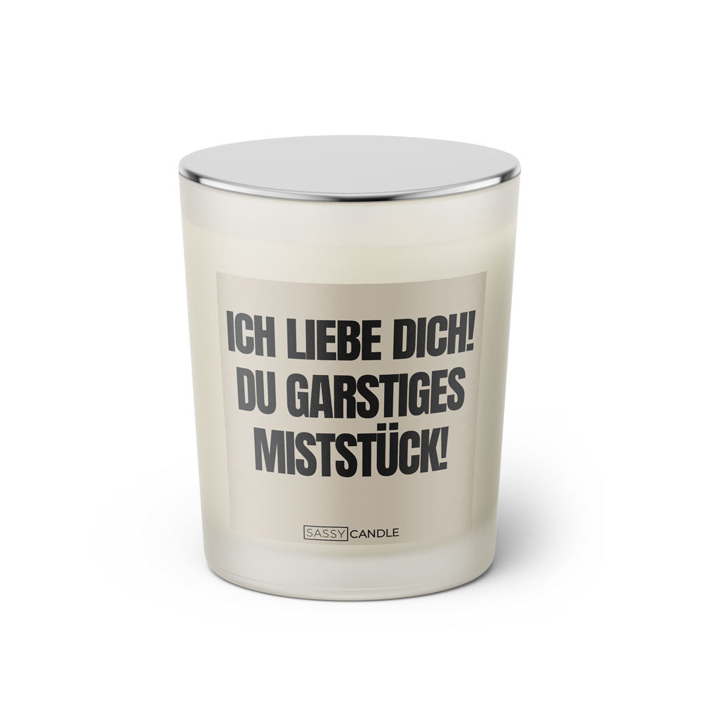 Duftkerze mit Spruch: Ich liebe dich! Du garstiges Miststück! Farbe beige und schwarz von Sassy Candle.