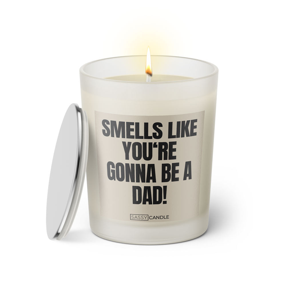 Duftkerze mit witzigen Spruch: Smells like you're gonna be a Dad! Farbe beige und schwarz von Sassy Candle.