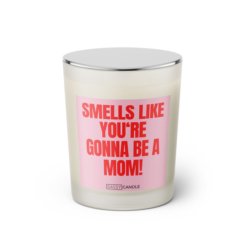 Duftkerze mit witzigen Spruch: Smells like you're gonna be a Mom! Farbe rosa und pink von Sassy Candle.