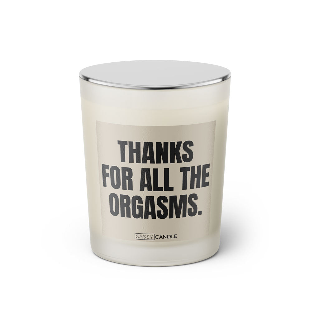 Duftkerze mit witzigem Spruch: Thank you for all the orgasms. Farbe beige und schwarze Schrift. Kerzenglas mit silbernem geschlossenem Deckel von SassyCandle.