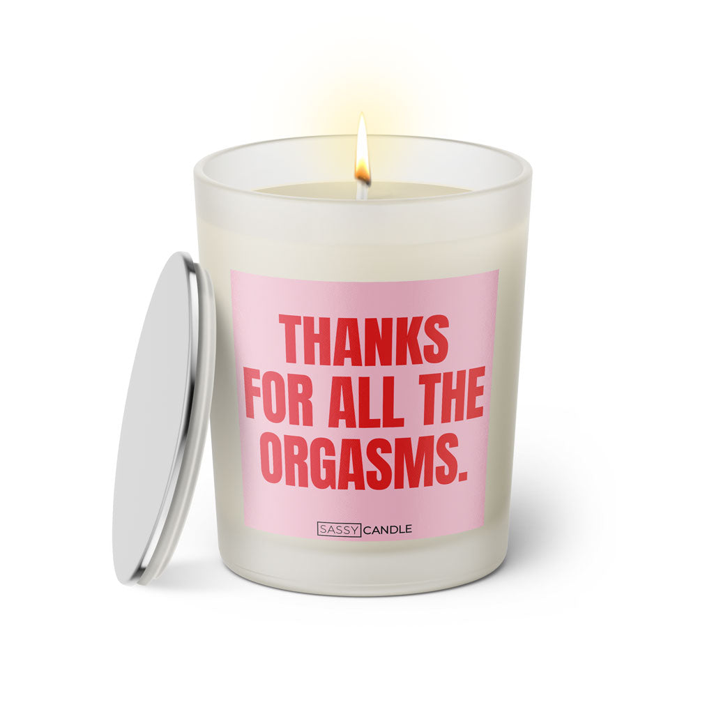 Duftkerze mit witzigem Spruch: Thank you for all the orgasms. Farbe rosa und pinke Schrift. Kerzenglas mit silbernem geschlossenem Deckel von SassyCandle.