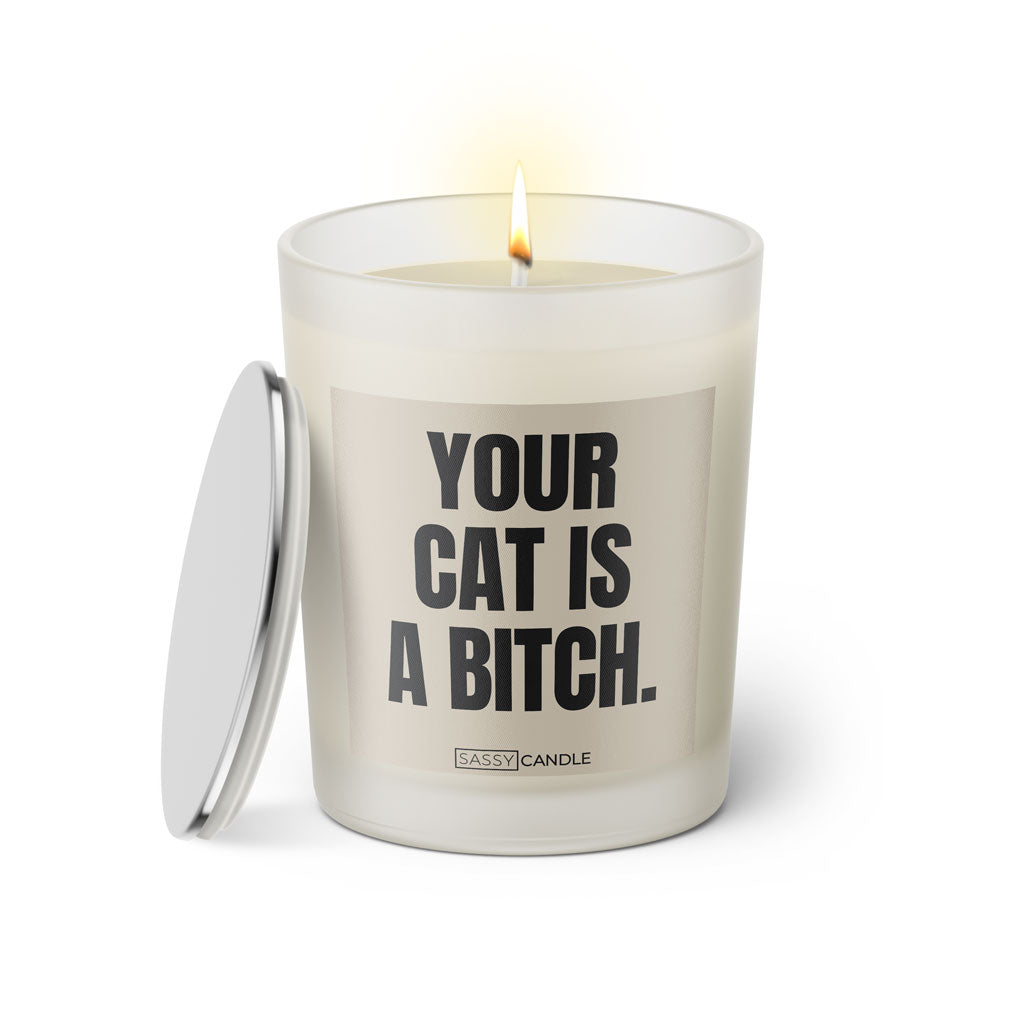 Duftkerze mit witzigen Spruch: Your Cat is a Bitch. Farbe beige und schwarz von Sassy Candle.