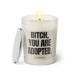 Duftkerze mit witzigen Spruch: Bitch, you are adopted. Farbe beige und schwarz von Sassy Candle.