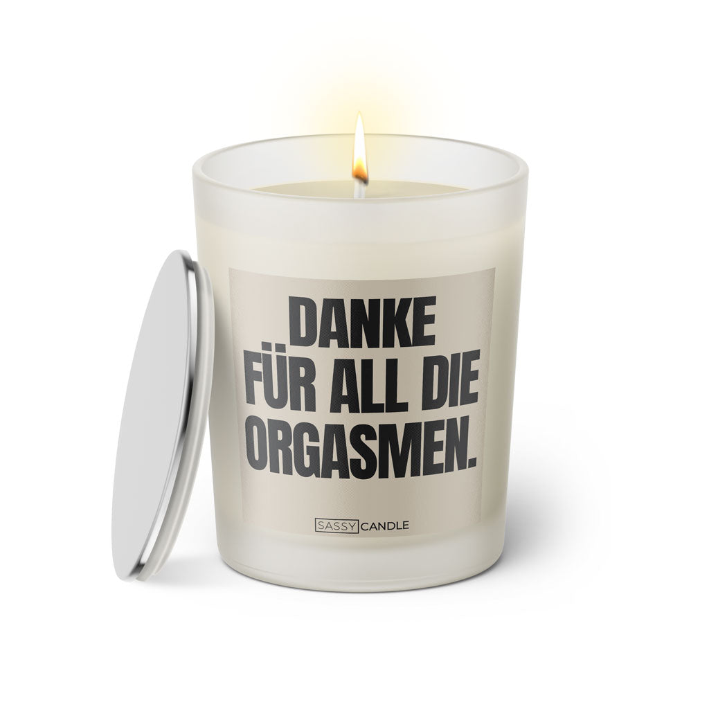 Duftkerze mit witzigen Spruch: Danke für all die Orgasmen. Farbe beige und schwarz von Sassy Candle.