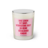 Duftkerze mit witzigem Spruch: Das Leben ist hart. Wenigstens hast du keine hässlichen Kinder. Farbe rosa und pinke Schrift. Kerzenglas mit silbernem geschlossenem Deckel von SassyCandle.