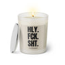 Duftkerze mit Spruch: HLY. FCK. SHT. Farbe beige und schwarz von Sassy Candle.