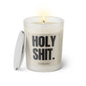 Duftkerze mit witzigen Spruch: Holy Shit. Farbe beige und schwarz von Sassy Candle.
