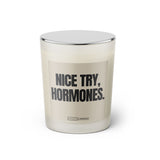 Duftkerze mit Spruch: Nice try, hormones. Farbe beige und schwarz von Sassy Candle.