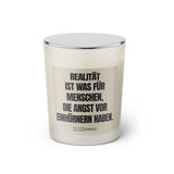 Duftkerze mit witzigen Spruch: Realität ist was für Menschen, die Angst vor Einhörnern haben Farbe beige und schwarz von Sassy Candle.